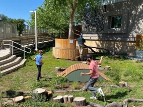 students at the Explora! pocket garden on planting day